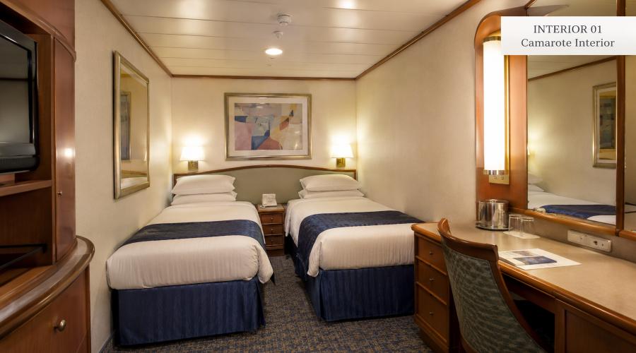 Camarote interior con camas individuales en Grandeur of the Seas